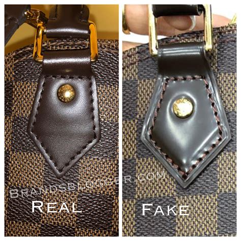 louis vuitton alma bb authentic vs fake|authentic alma purse.